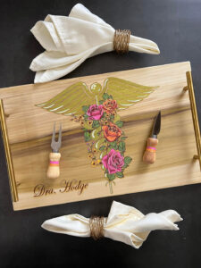 A beautiful custom serving cheese boards created by Hivedeco