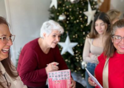 Annie having a great time with guests talking about the "Women from the Bible" coloring book outside the church.